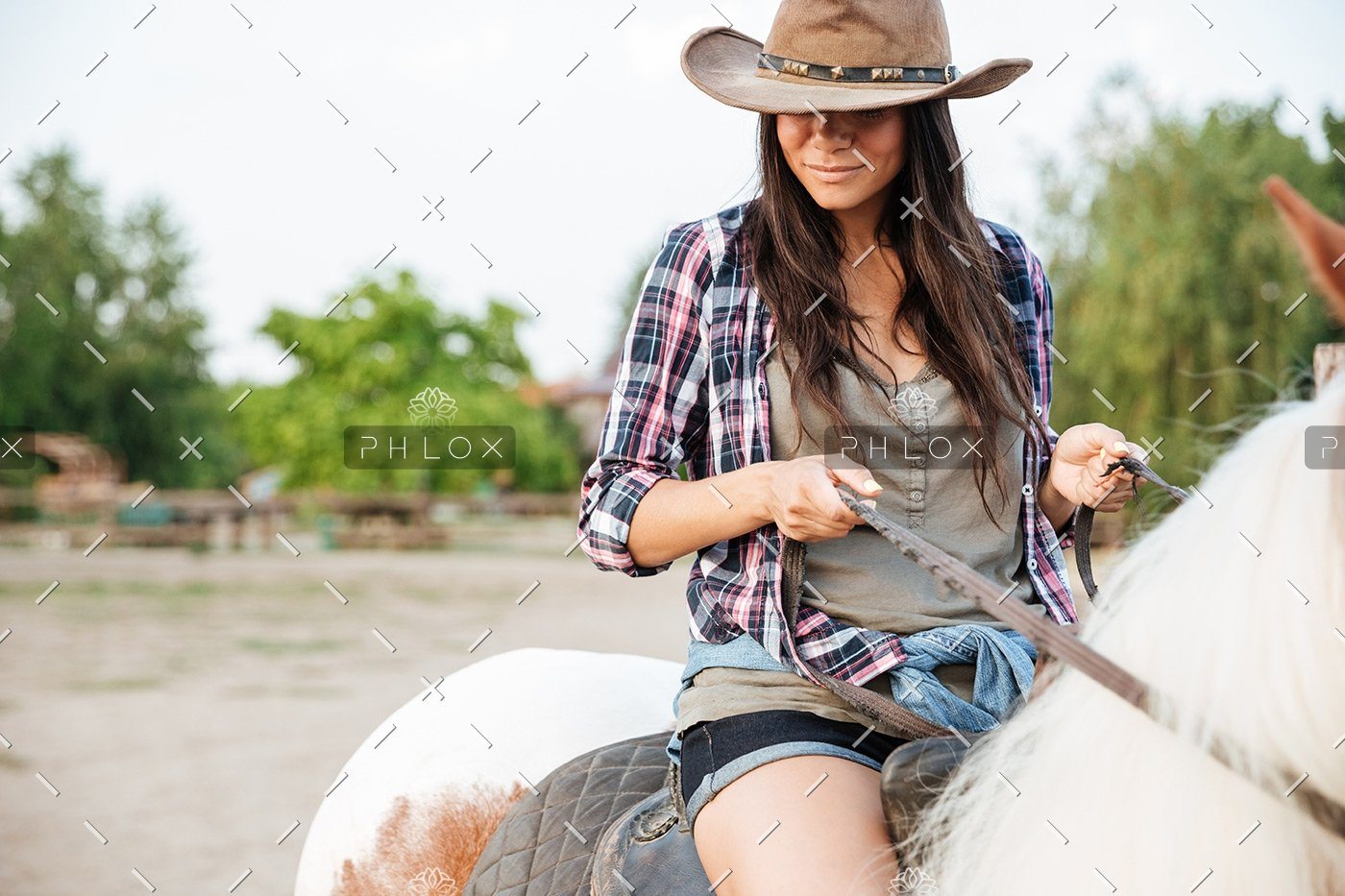 demo-attachment-19-beautiful-young-woman-cowgirl-sitting-and-riding-P3DWVG6